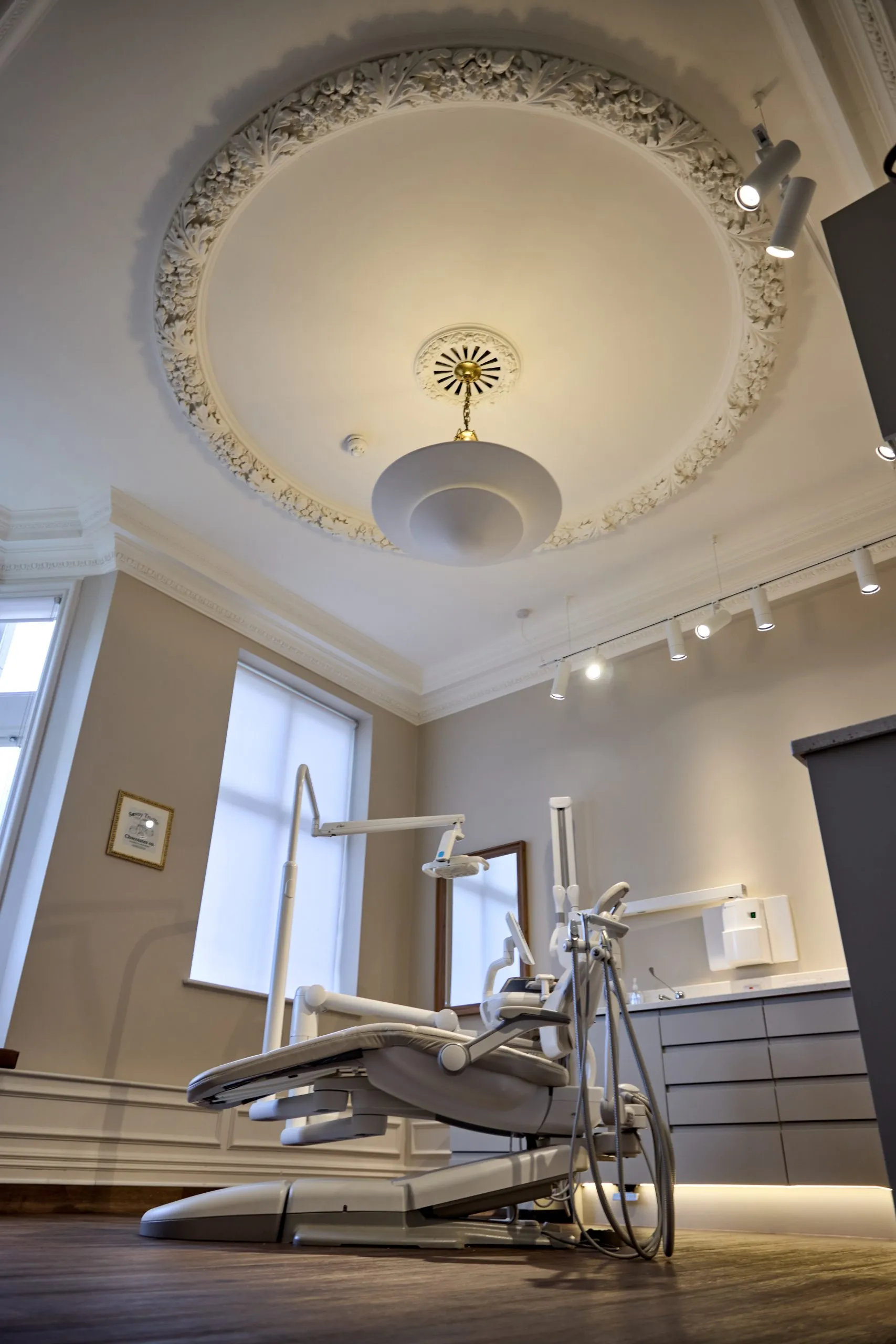 Dental chair beneath the restored ornate ceiling rose at Union Quay Dental, Tynemouth